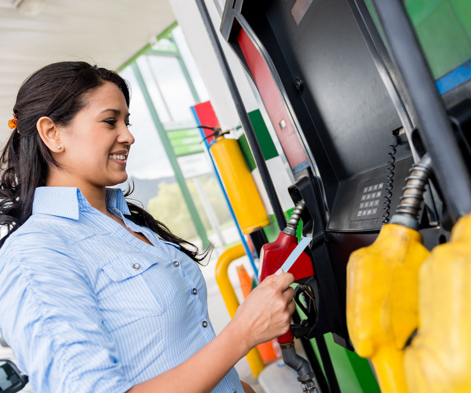 Woman at gas pump